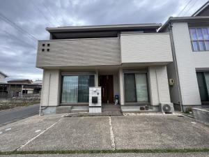 透湿性塗料でクリヤー塗装　意匠性を残した外壁塗装